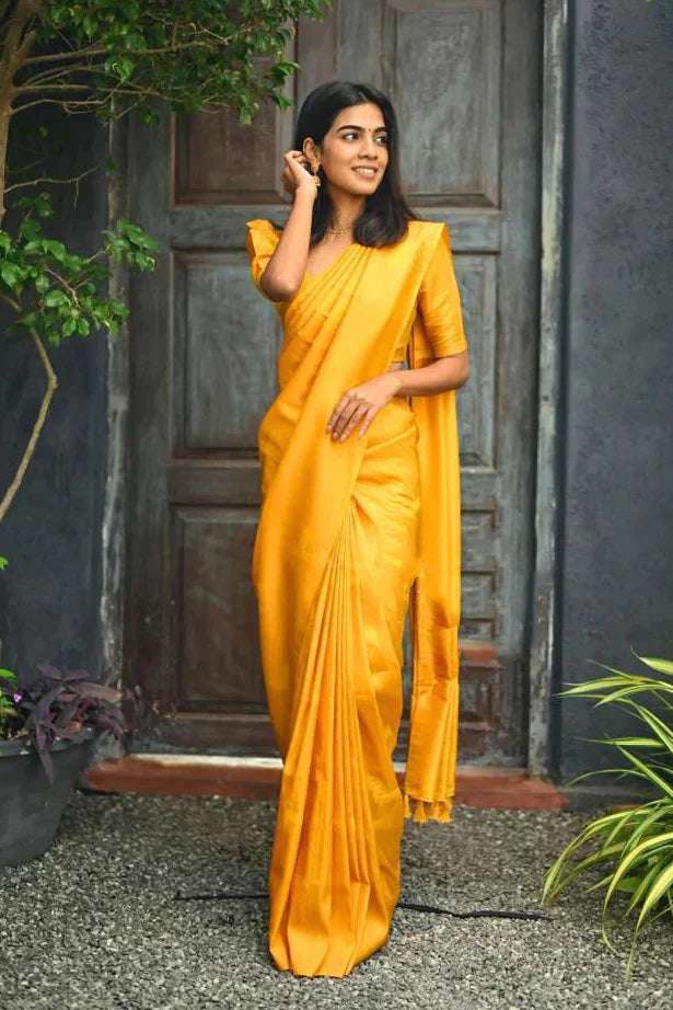 Efflorescence Yellow Soft Silk Saree With Engrossing Blouse Piece