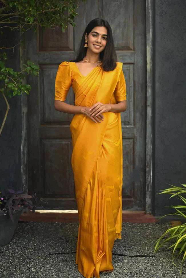Efflorescence Yellow Soft Silk Saree With Engrossing Blouse Piece