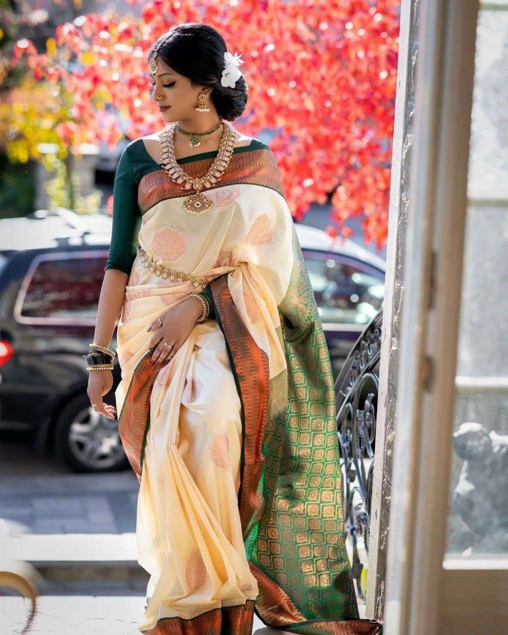 Enchanting Cream Banarasi Silk Saree With Polished Blouse Piece