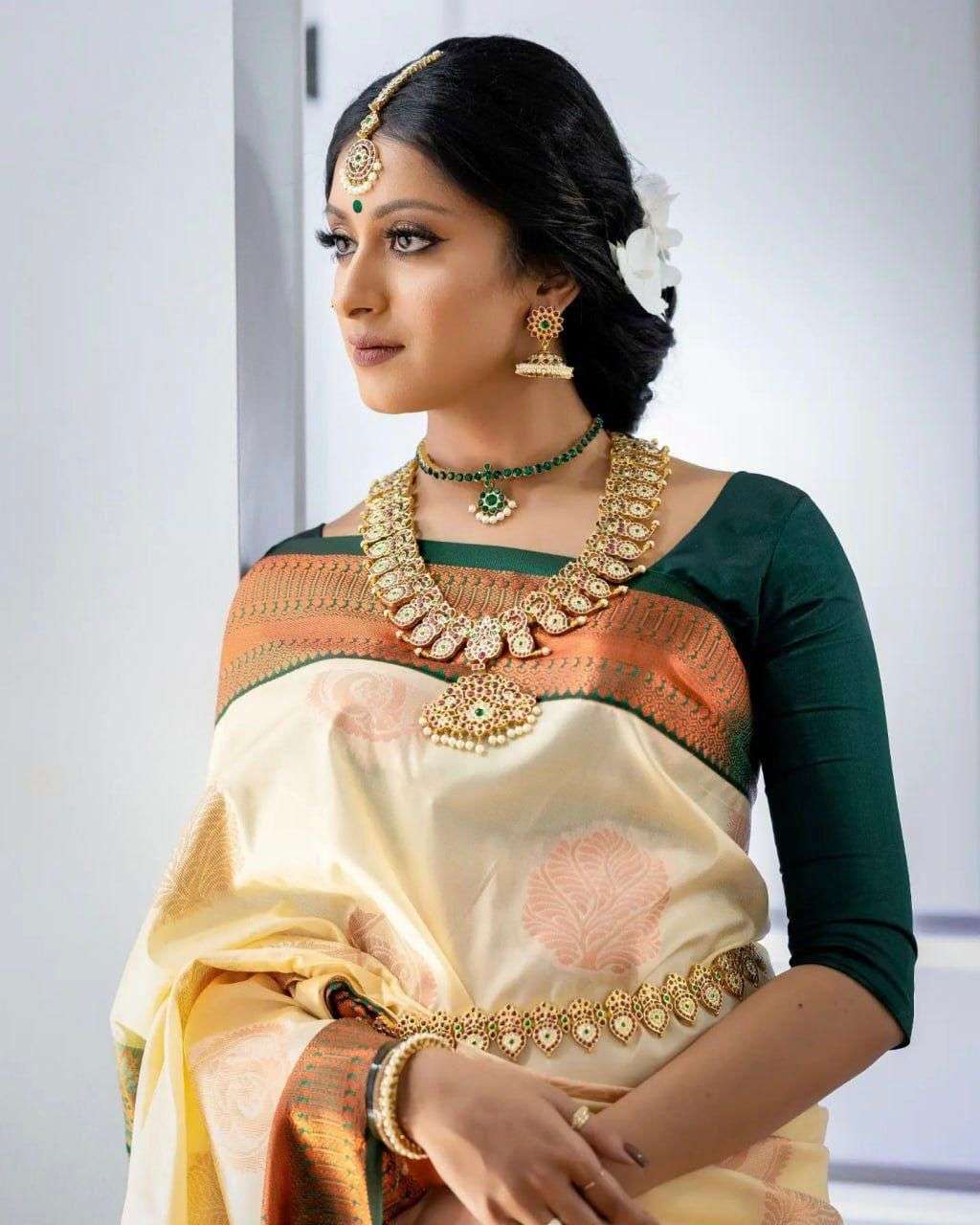Enchanting Cream Banarasi Silk Saree With Polished Blouse Piece