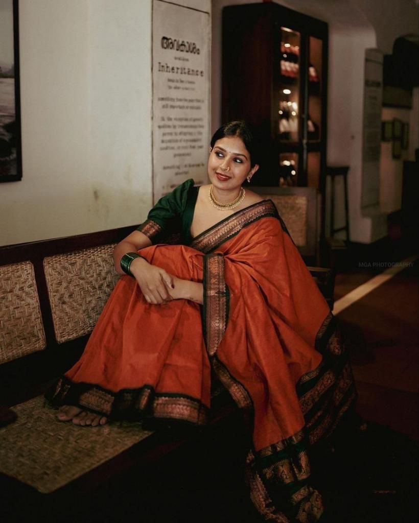 Dalliance Orange Soft Silk Saree With Mellifluous Blouse Piece