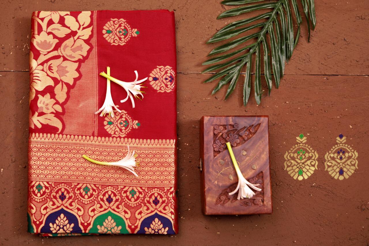Captivating Red Banarasi Silk Saree With Transcendental Blouse Piece