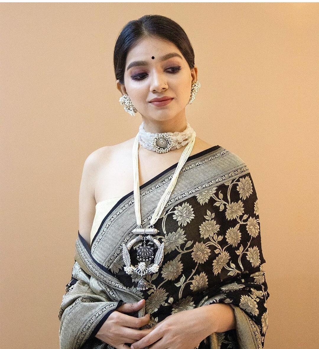 Mellifluent Black Banarasi Silk Saree With Transcendent Blouse Piece