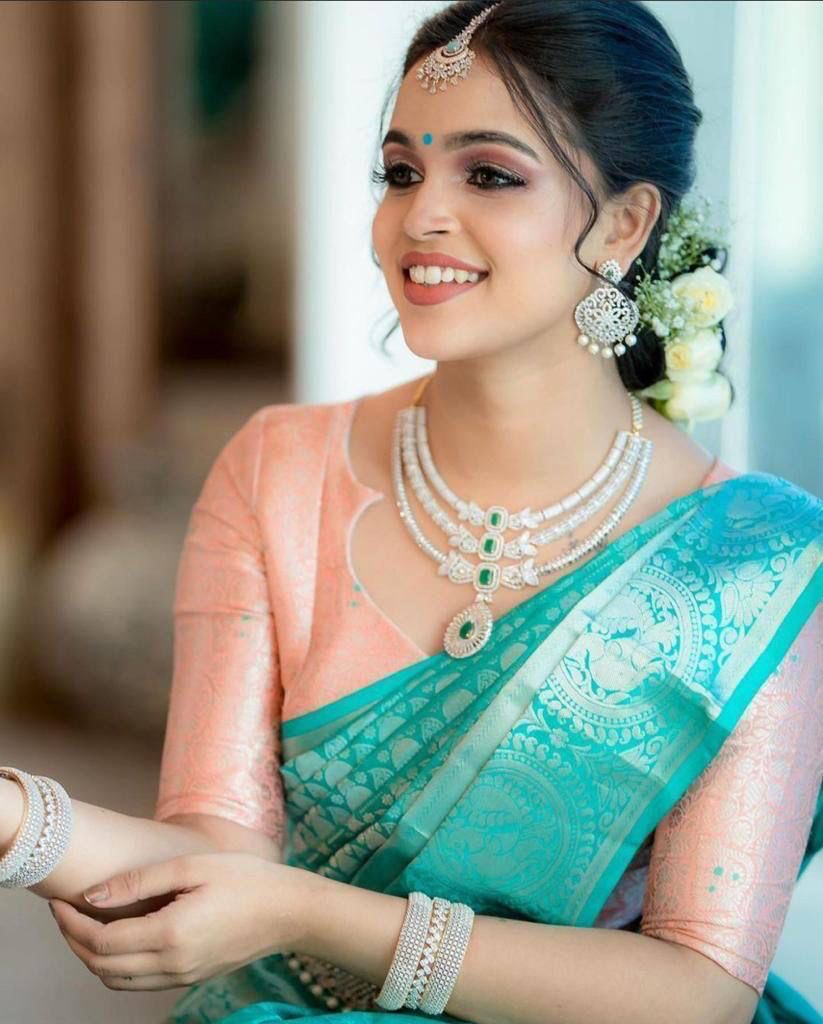 Glamorous Firozi Soft Silk Saree With Gorgeous Blouse Piece