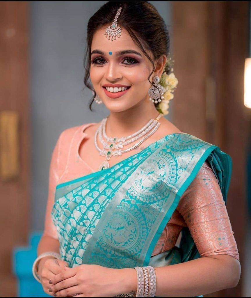 Glamorous Firozi Soft Silk Saree With Gorgeous Blouse Piece