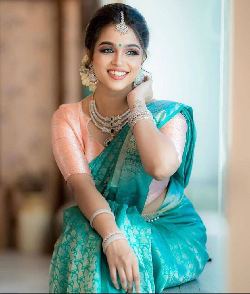 Glamorous Firozi Soft Silk Saree With Gorgeous Blouse Piece