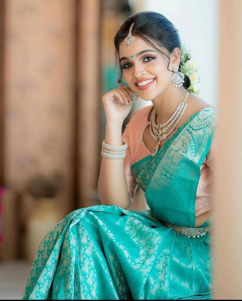 Glamorous Firozi Soft Silk Saree With Gorgeous Blouse Piece