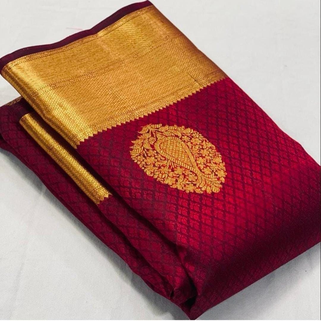 Bewitching Maroon Banarasi Silk Saree With Serene Blouse Piece