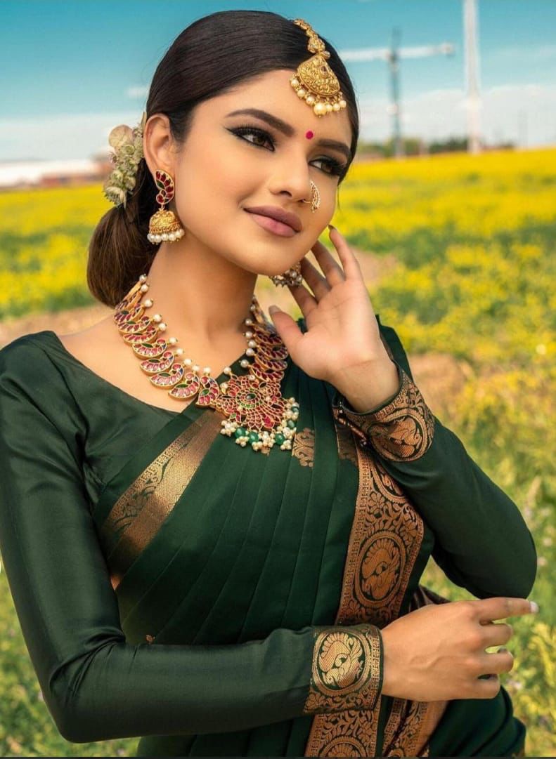 Evocative Green Soft Silk Saree With Unique Blouse Piece