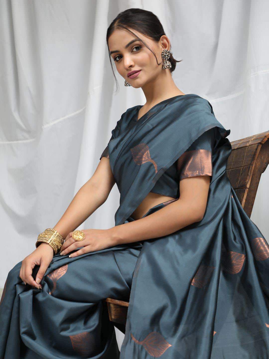 Engaging Grey Soft Silk Saree With Enveloping Blouse Piece