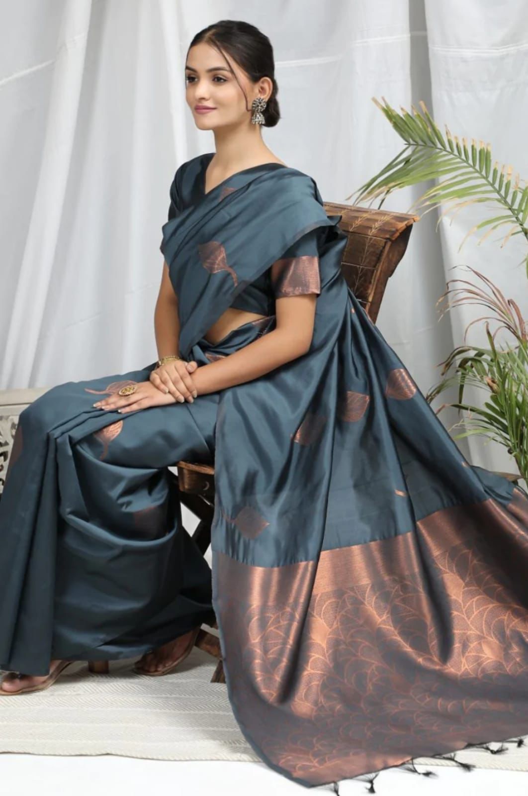 Engaging Grey Soft Silk Saree With Enveloping Blouse Piece