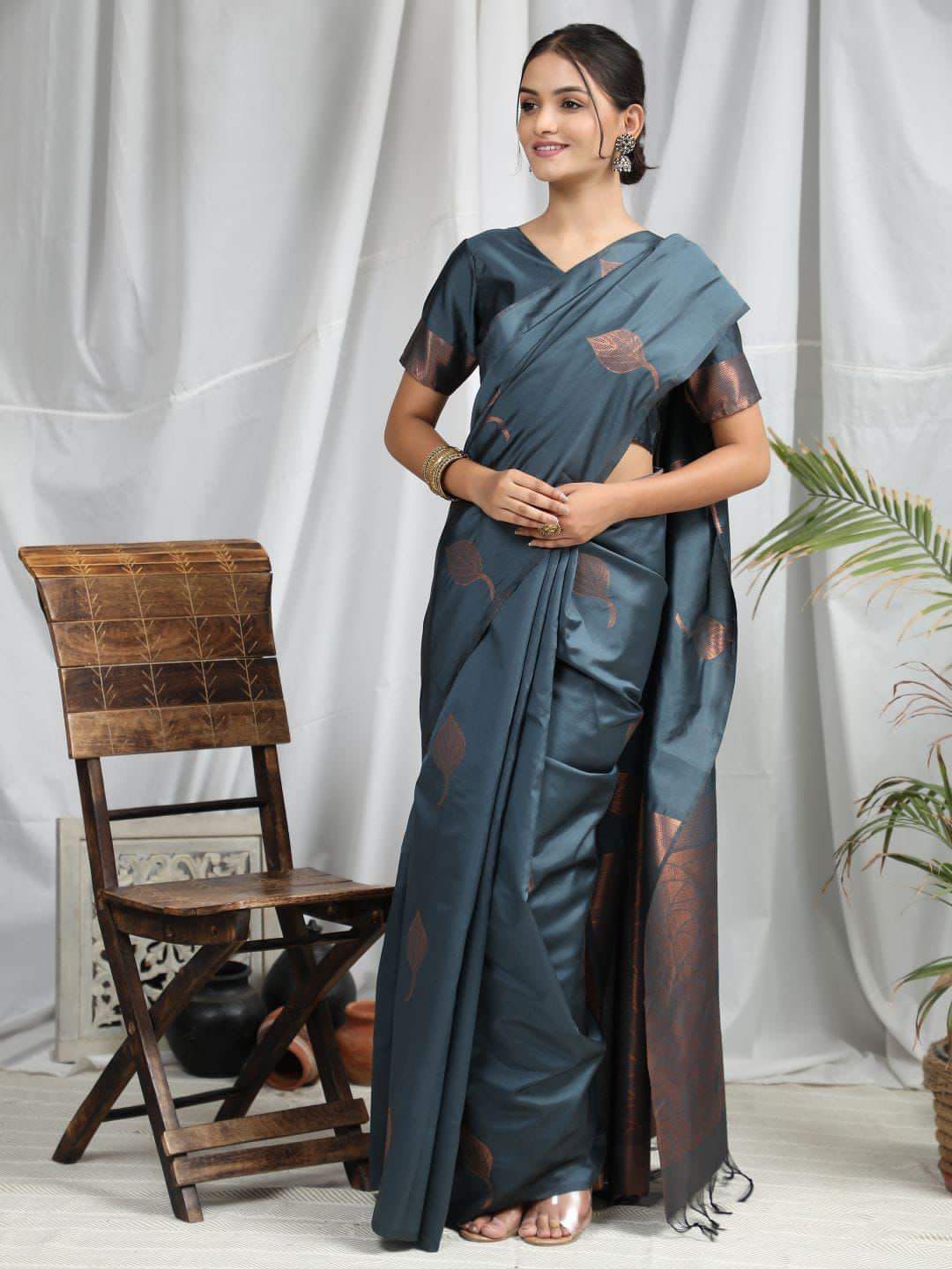 Engaging Grey Soft Silk Saree With Enveloping Blouse Piece