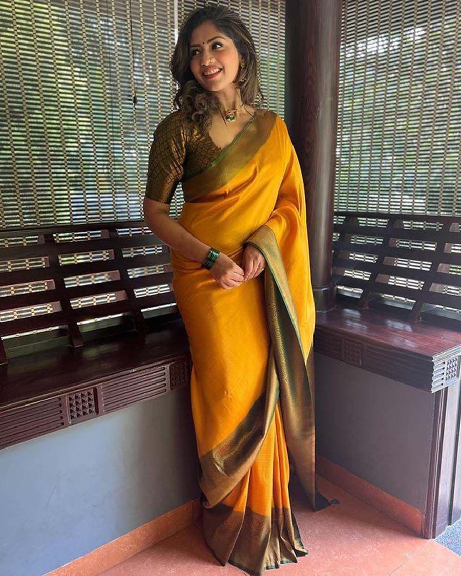 Opulent Yellow Banarasi Silk Saree With Fashionable Blouse Piece