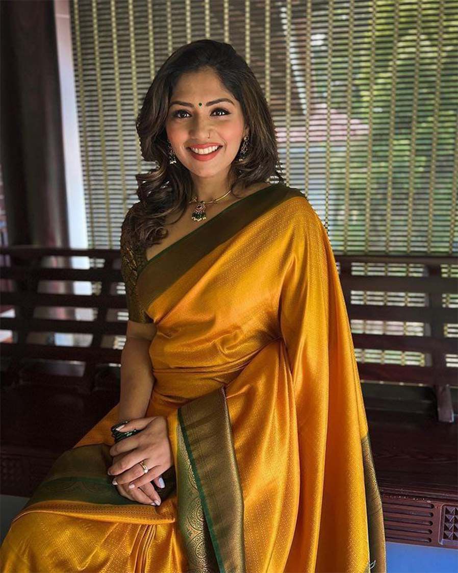 Opulent Yellow Banarasi Silk Saree With Fashionable Blouse Piece