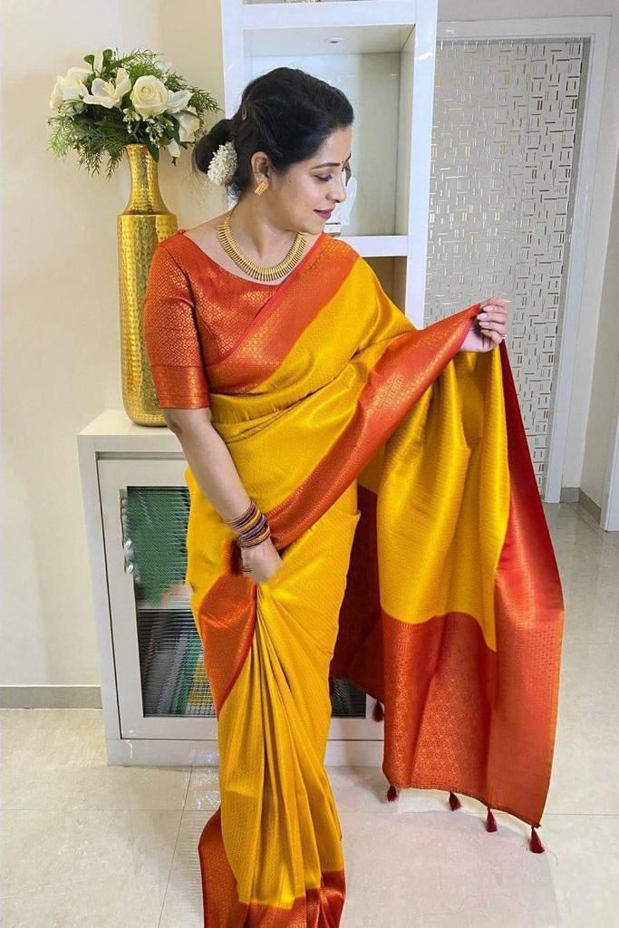 Captivating Yellow Soft Silk Saree With Pleasing Blouse Piece