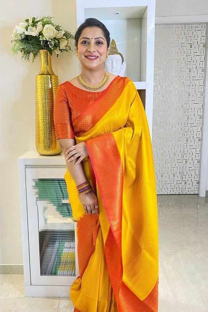 Captivating Yellow Soft Silk Saree With Pleasing Blouse Piece