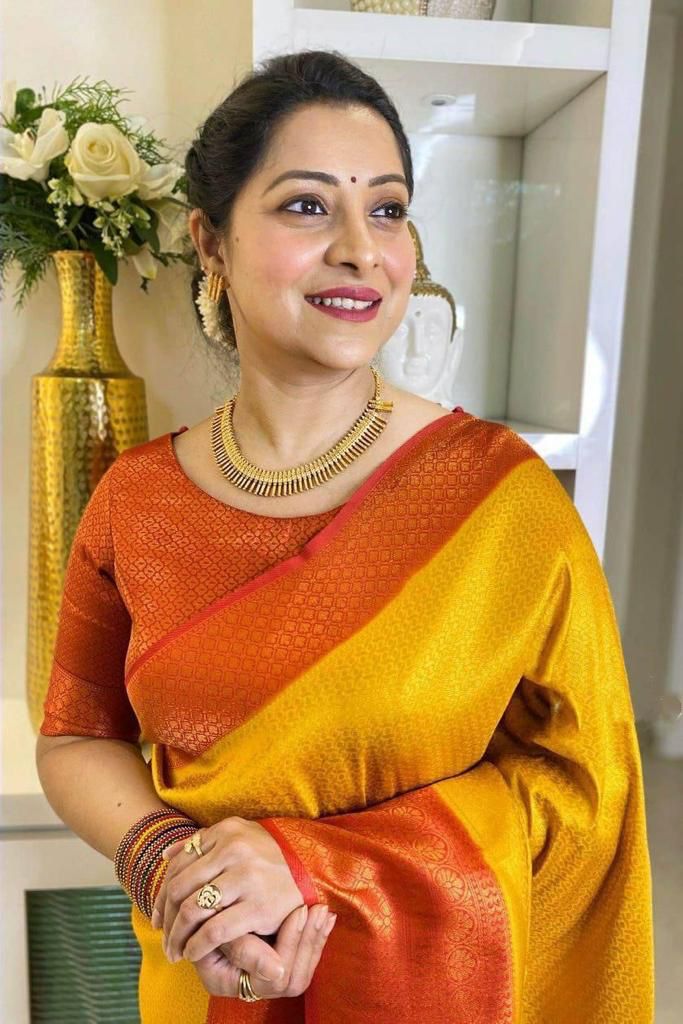 Captivating Yellow Soft Silk Saree With Pleasing Blouse Piece