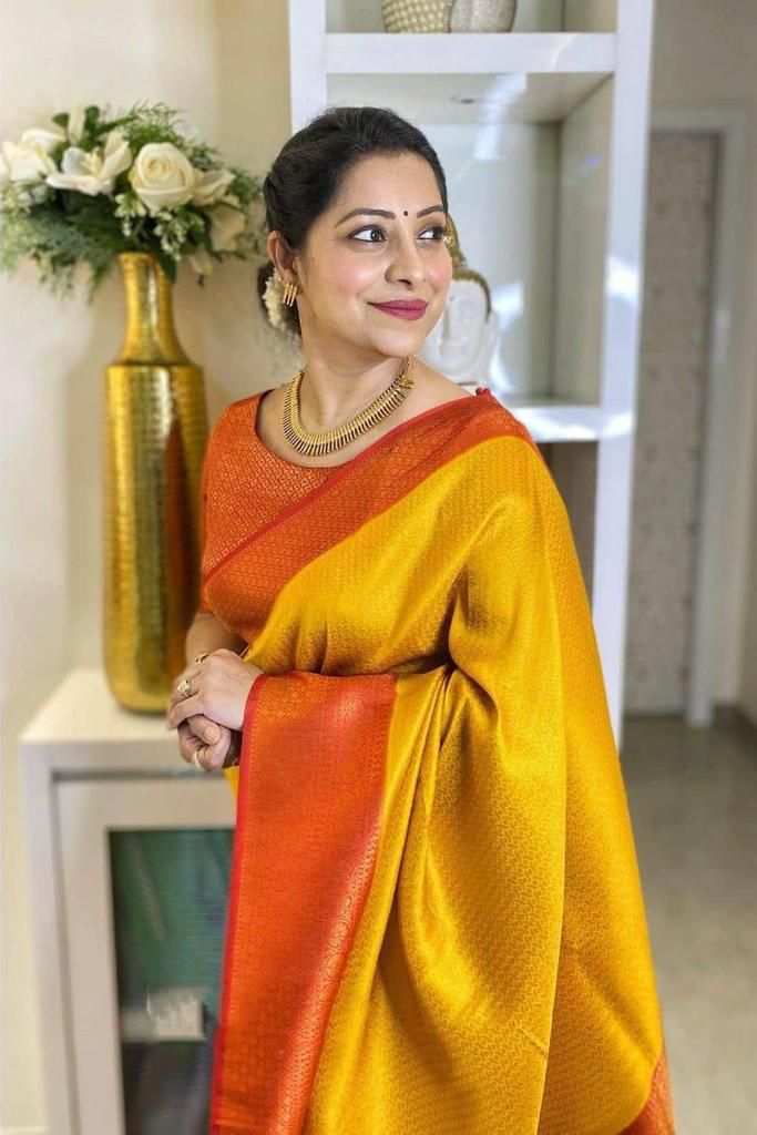 Captivating Yellow Soft Silk Saree With Pleasing Blouse Piece