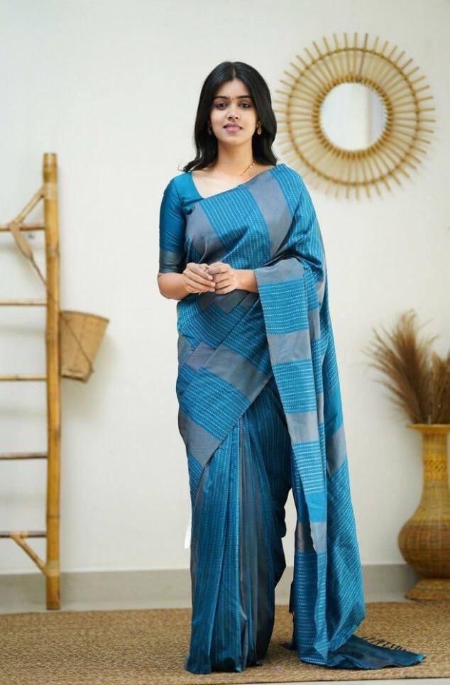 Radiating Firozi Soft Silk Saree With Festive Blouse Piece