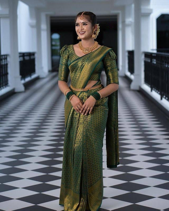 Demanding Green Soft Silk Saree With Charming Blouse Piece