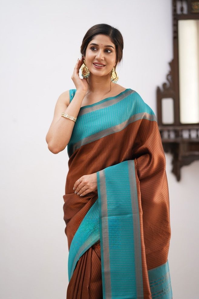 Striking Brown Soft Silk Saree With Radiant Blouse Piece