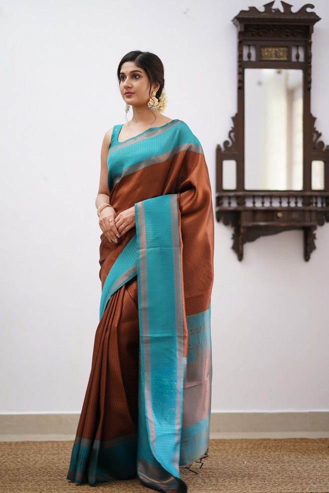 Striking Brown Soft Silk Saree With Radiant Blouse Piece