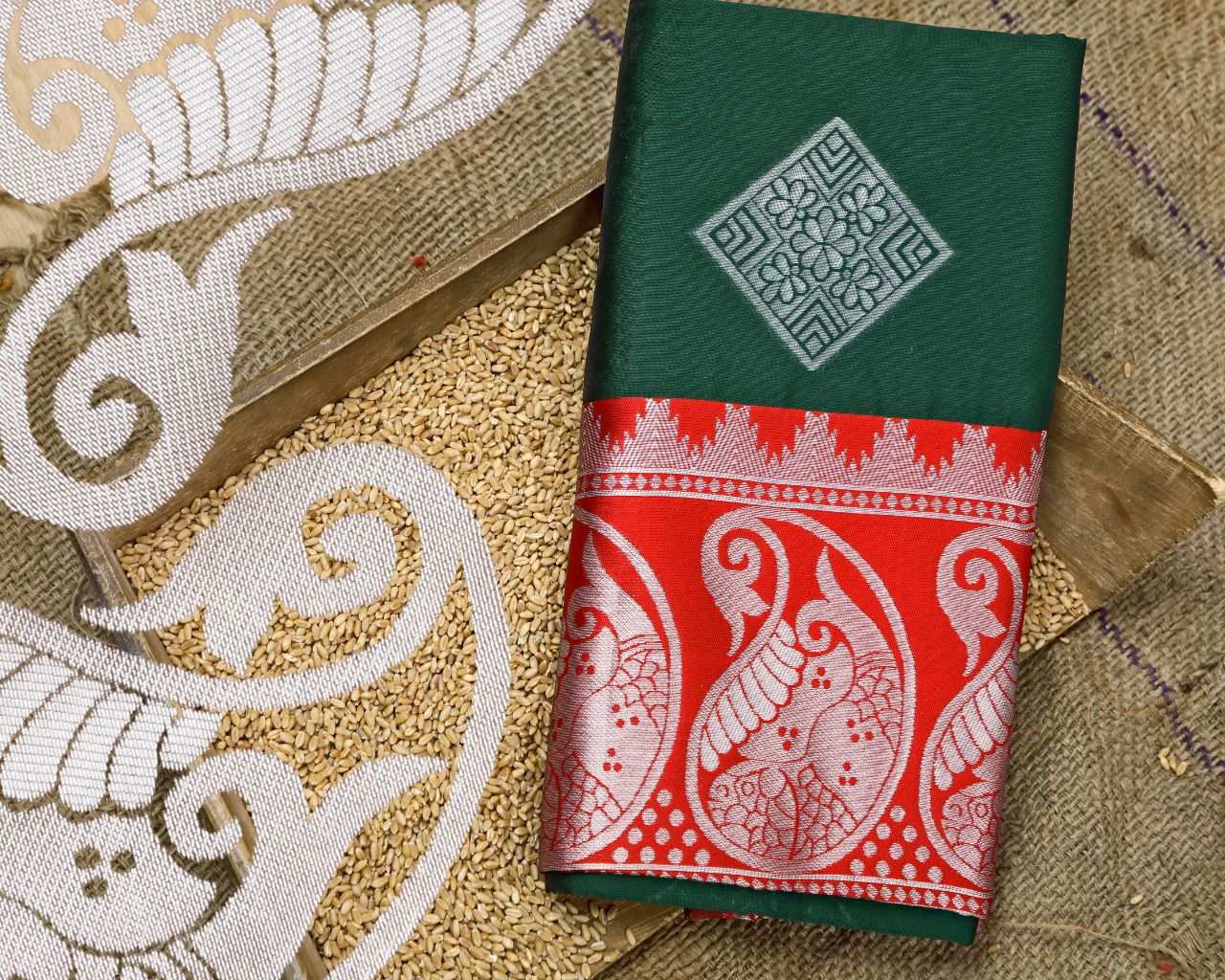 Gorgeous Green Soft Silk Saree With Flattering Blouse Piece