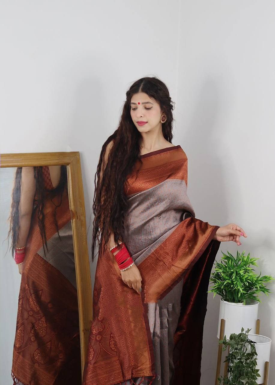Enrapturing Grey Soft Silk Saree With Alluring Blouse Piece