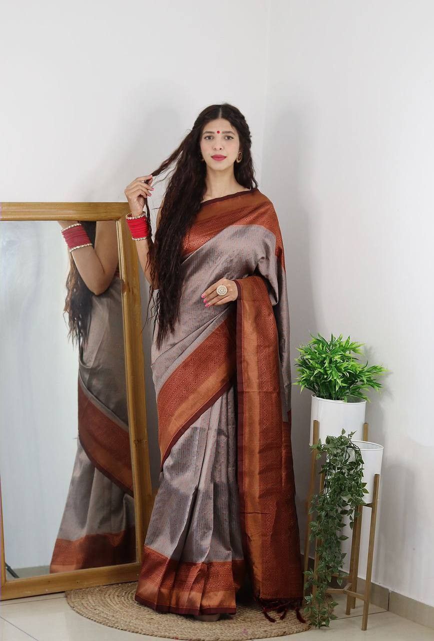Enrapturing Grey Soft Silk Saree With Alluring Blouse Piece