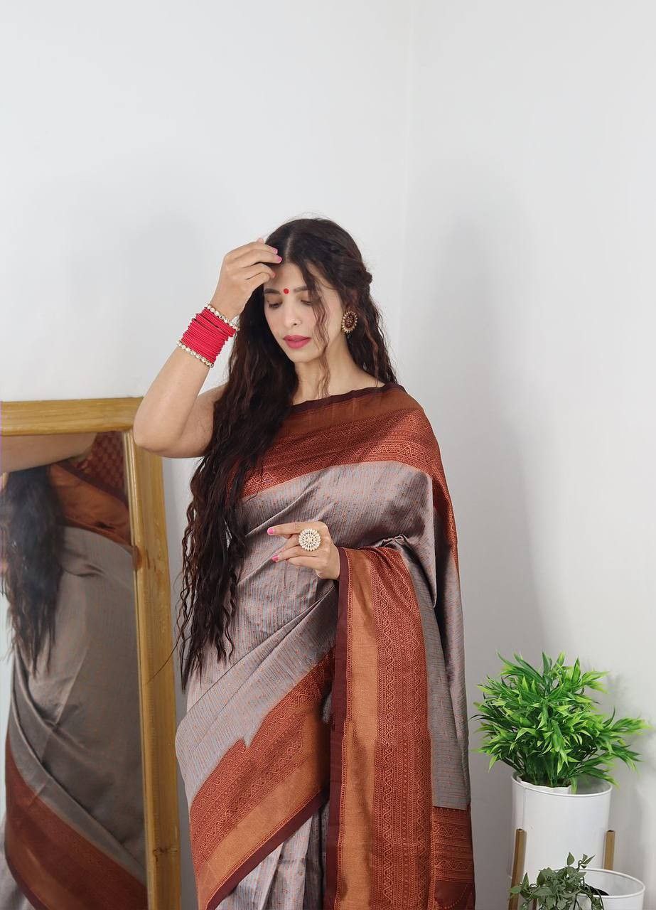 Enrapturing Grey Soft Silk Saree With Alluring Blouse Piece