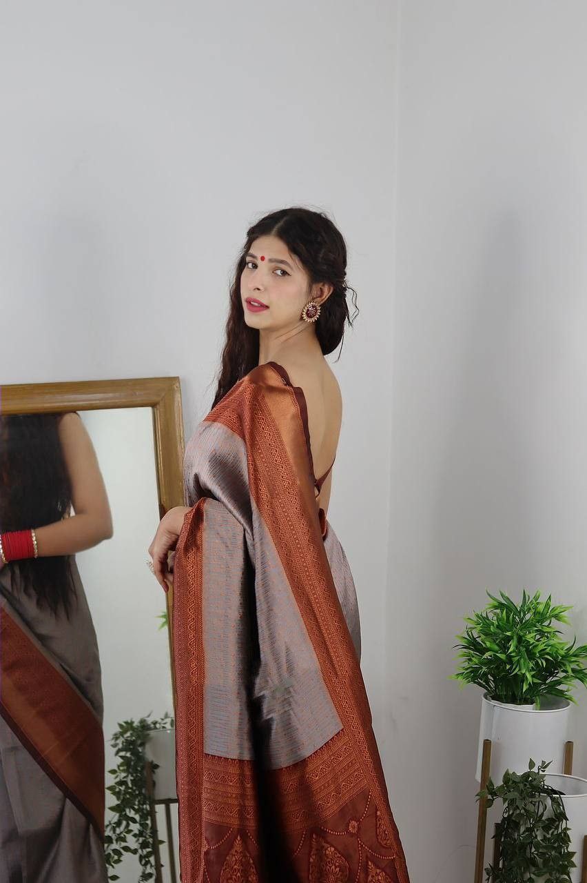 Enrapturing Grey Soft Silk Saree With Alluring Blouse Piece