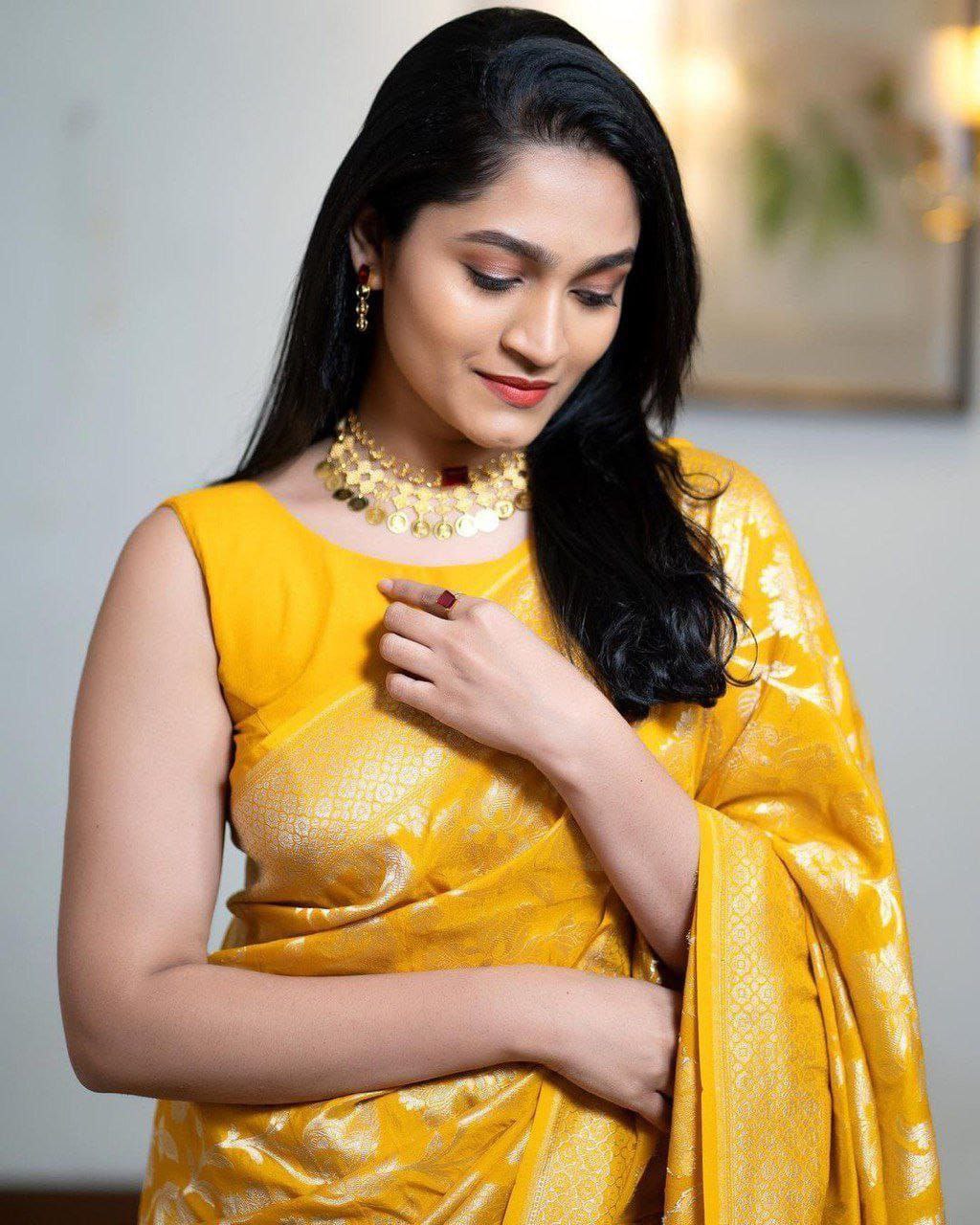 Gratifying Yellow Soft Silk Saree With Satisfying Blouse Piece