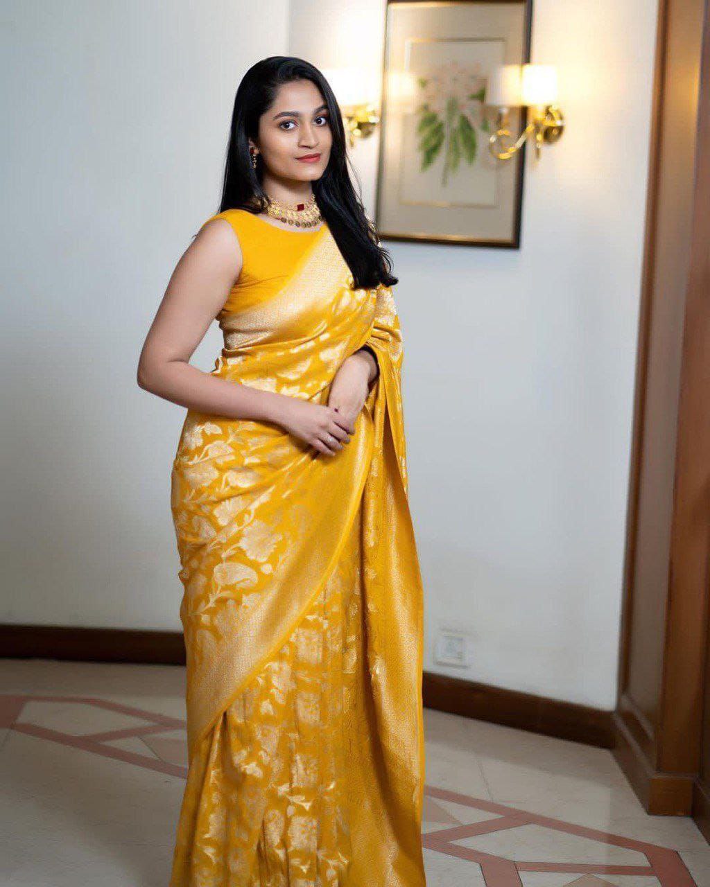Gratifying Yellow Soft Silk Saree With Satisfying Blouse Piece