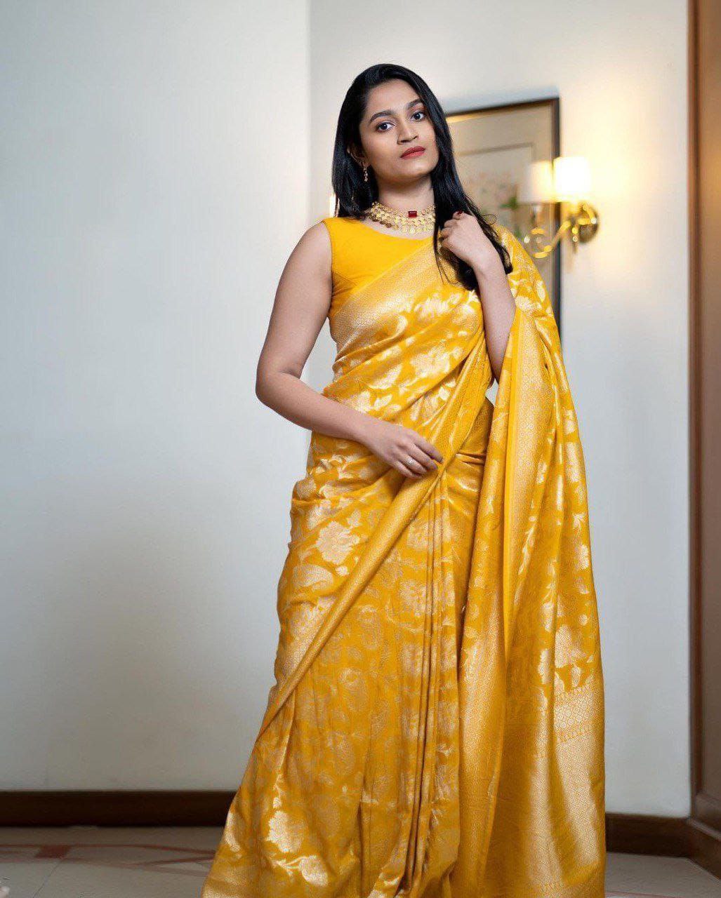 Gratifying Yellow Soft Silk Saree With Satisfying Blouse Piece