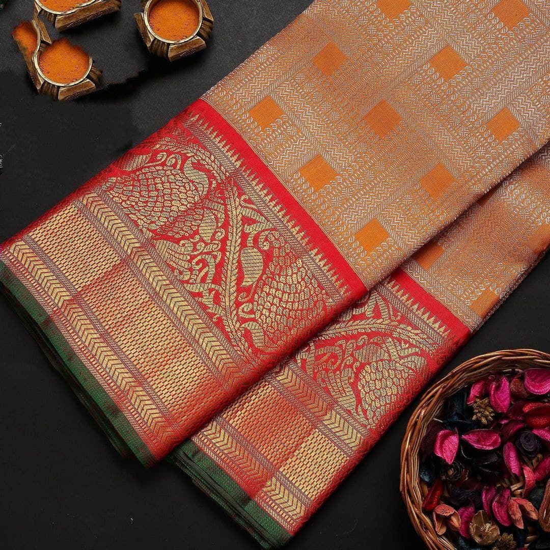 Charismatic Orange Soft Silk Saree With Two Prettiness Blouse Piece