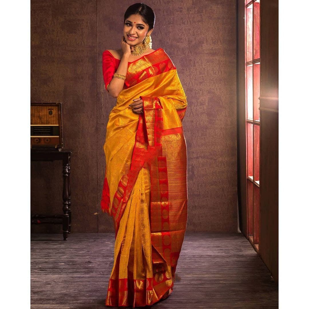 Bewitching Yellow Soft Silk Saree With Dazzling Blouse Piece