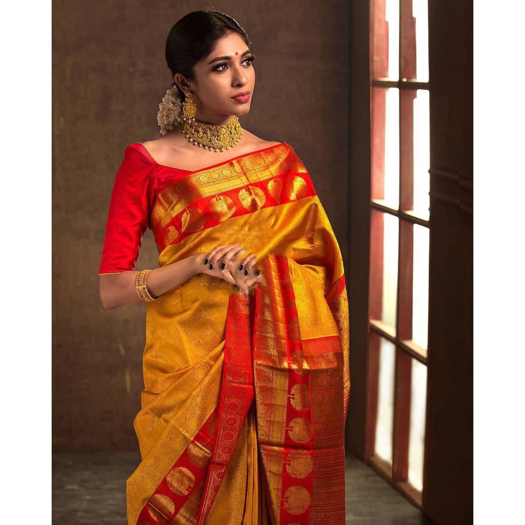 Bewitching Yellow Soft Silk Saree With Dazzling Blouse Piece