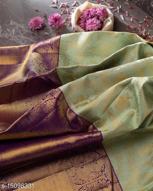 Bewitching Sea Green Soft Silk Saree With Tuneful Blouse Piece