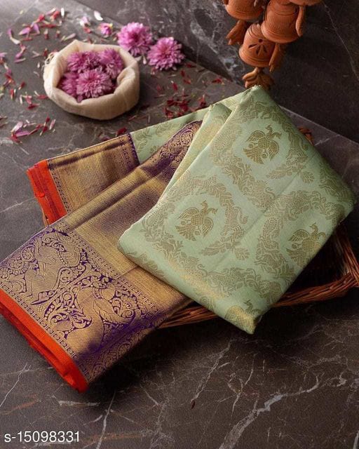 Bewitching Sea Green Soft Silk Saree With Tuneful Blouse Piece