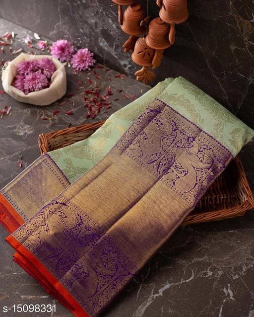 Bewitching Sea Green Soft Silk Saree With Tuneful Blouse Piece