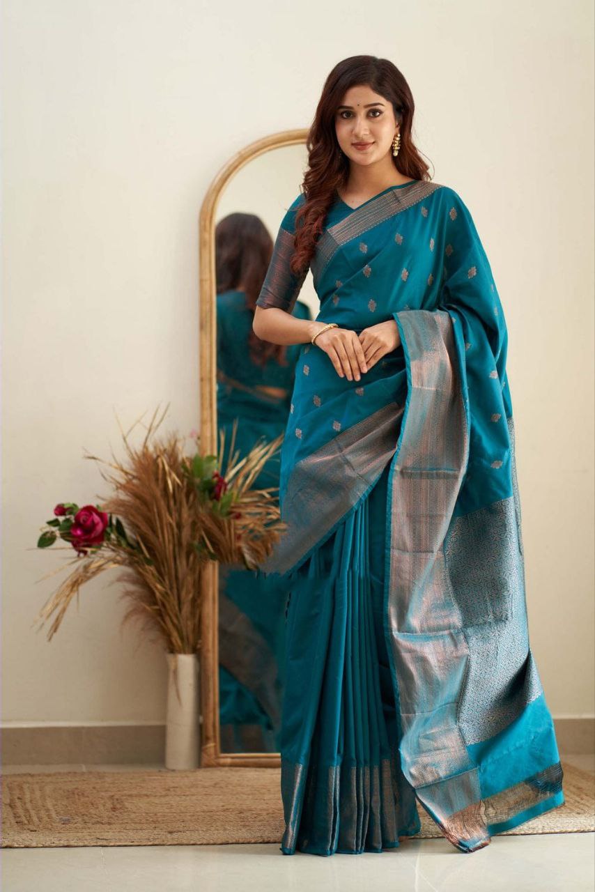 Exceptionally Firozi Soft Silk Saree With Enchanted Blouse Piece