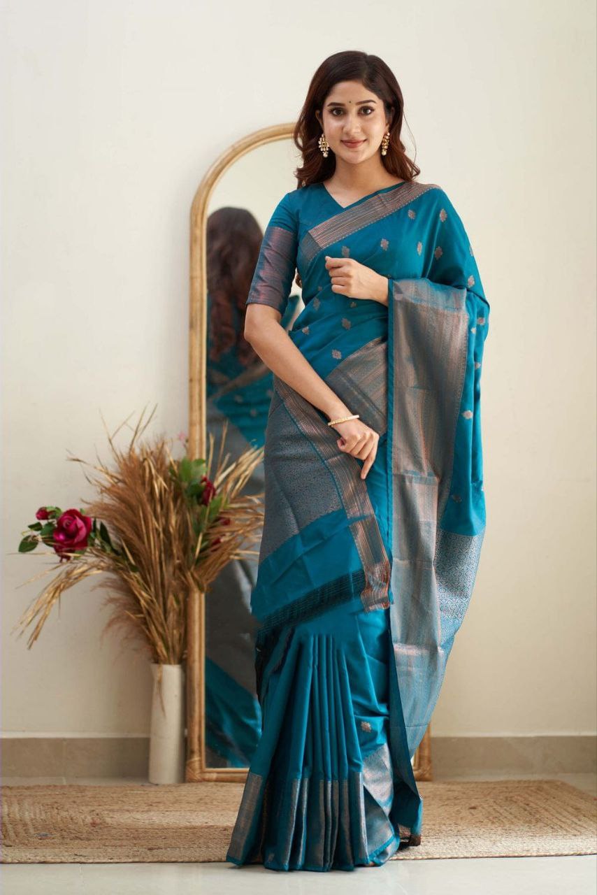 Exceptionally Firozi Soft Silk Saree With Enchanted Blouse Piece
