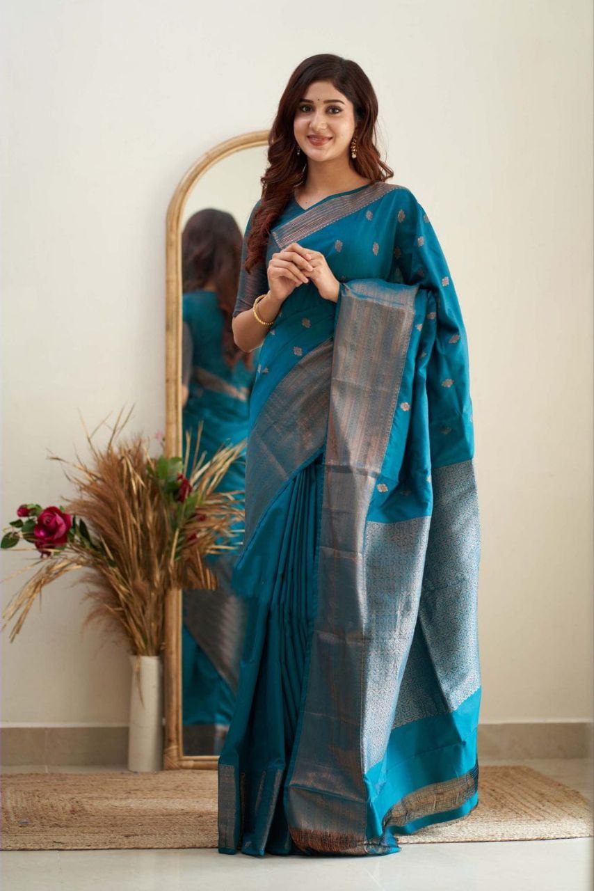Exceptionally Firozi Soft Silk Saree With Enchanted Blouse Piece