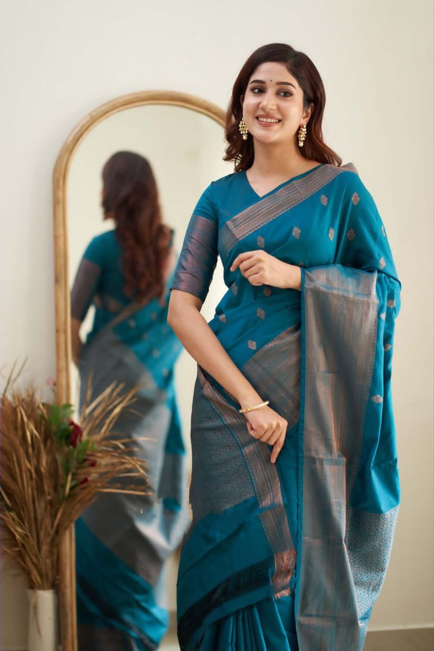 Exceptionally Firozi Soft Silk Saree With Enchanted Blouse Piece