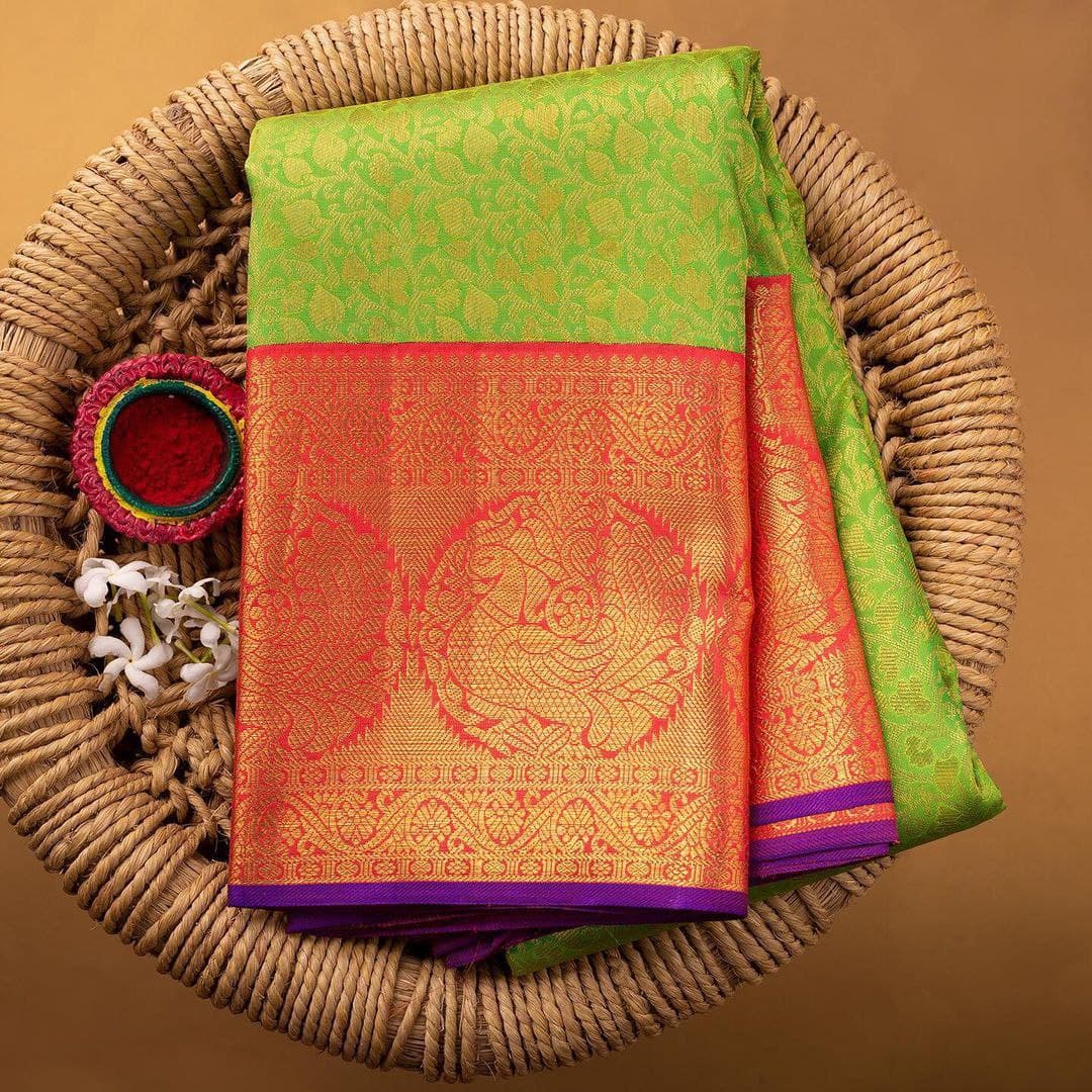 Gracefully Parrot Soft Silk Saree With Two Lovable Blouse Piece