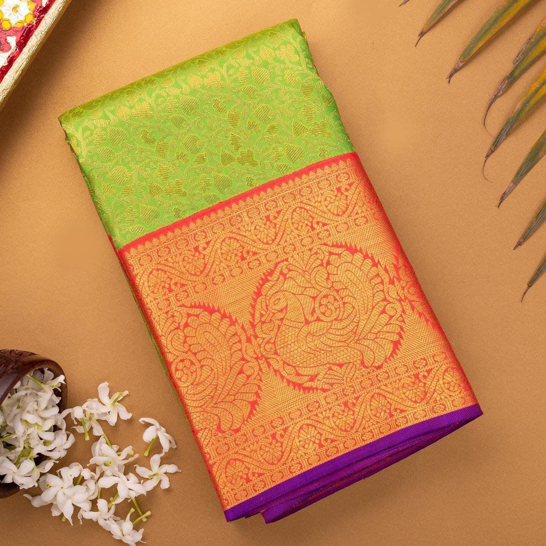 Gracefully Parrot Soft Silk Saree With Two Lovable Blouse Piece