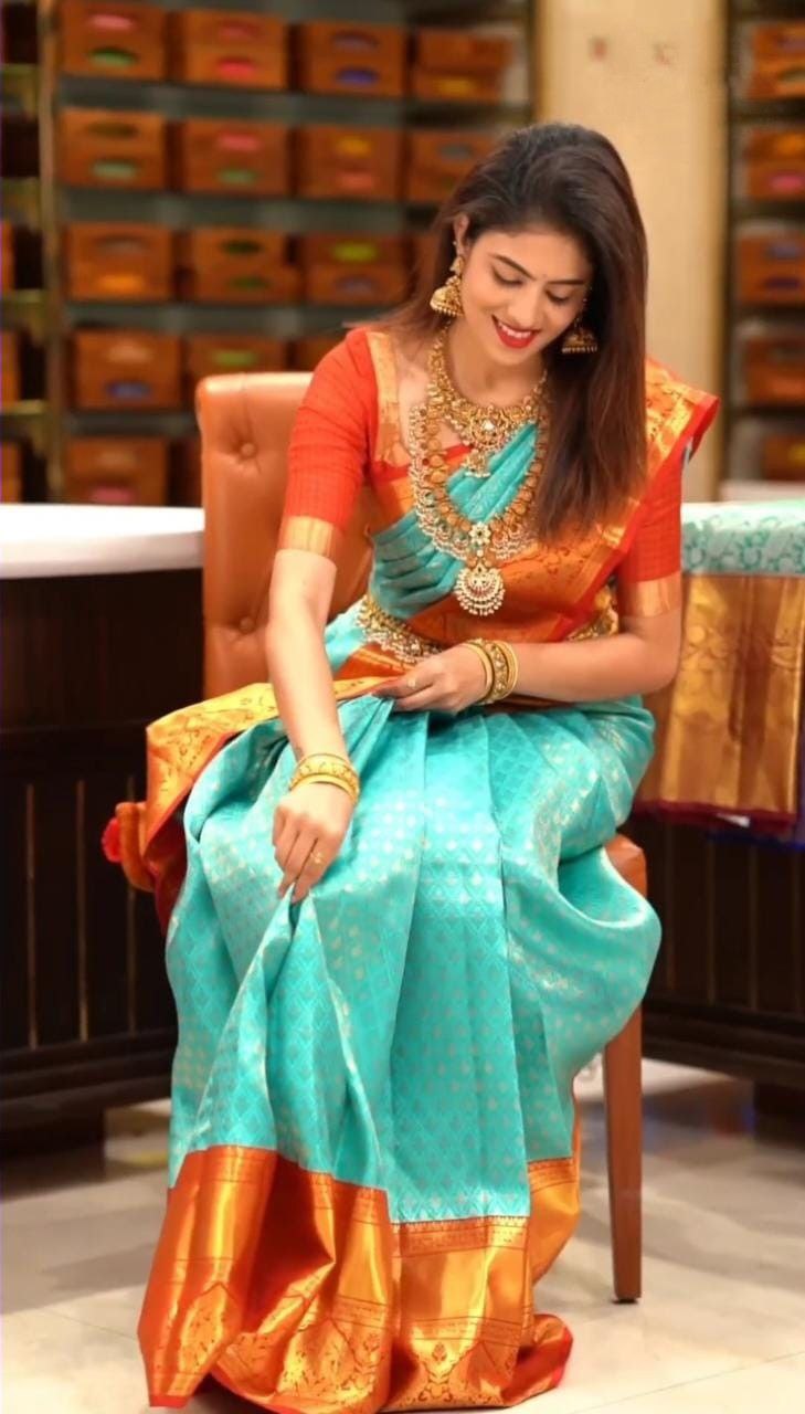 Lovely Turquoise Soft Silk Saree With Timeless Blouse Piece