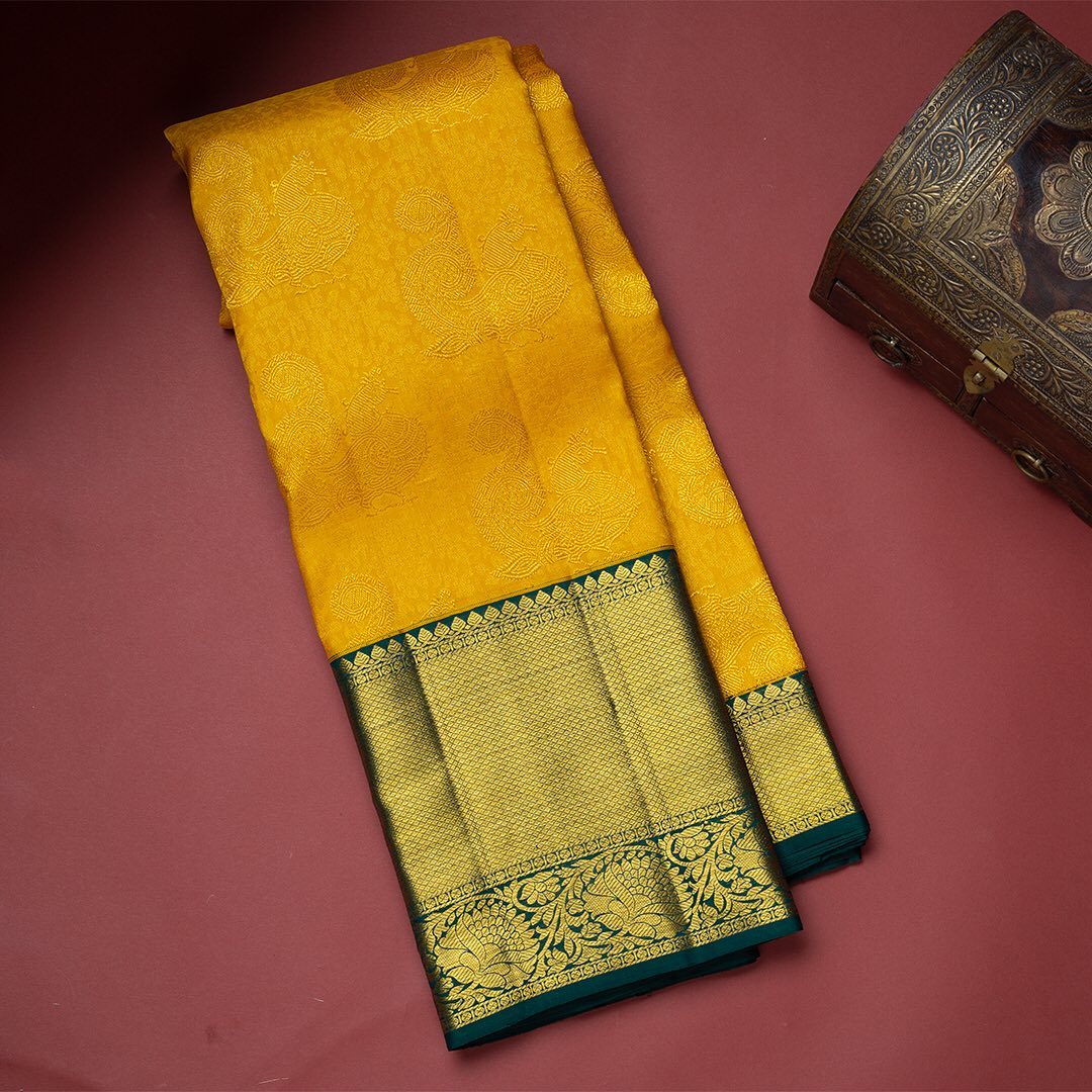 Dazzling Yellow Soft Silk Saree With Two Glistening Blouse Piece