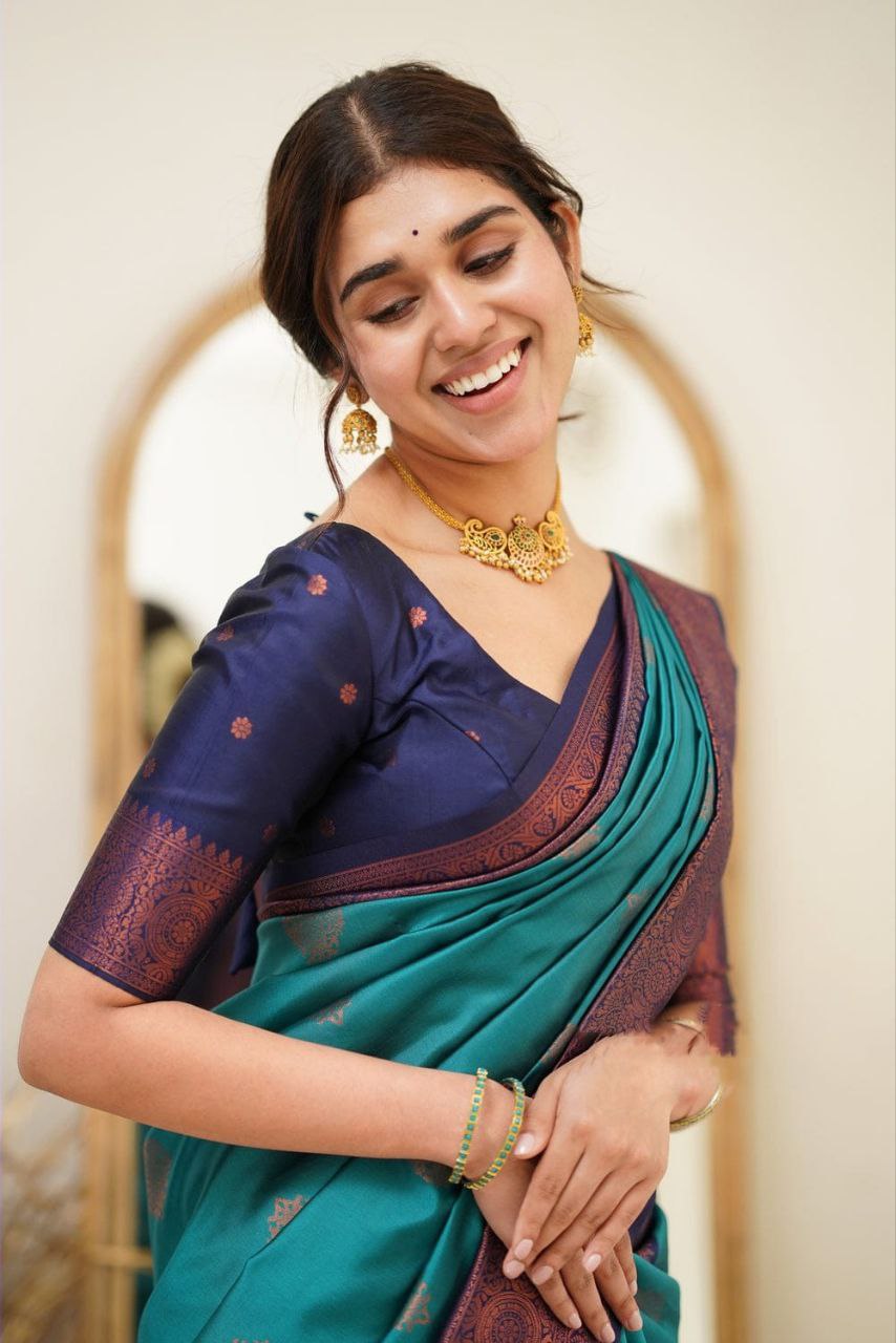 Statuesque Firozi Soft Silk Saree With Dignified Blouse Piece