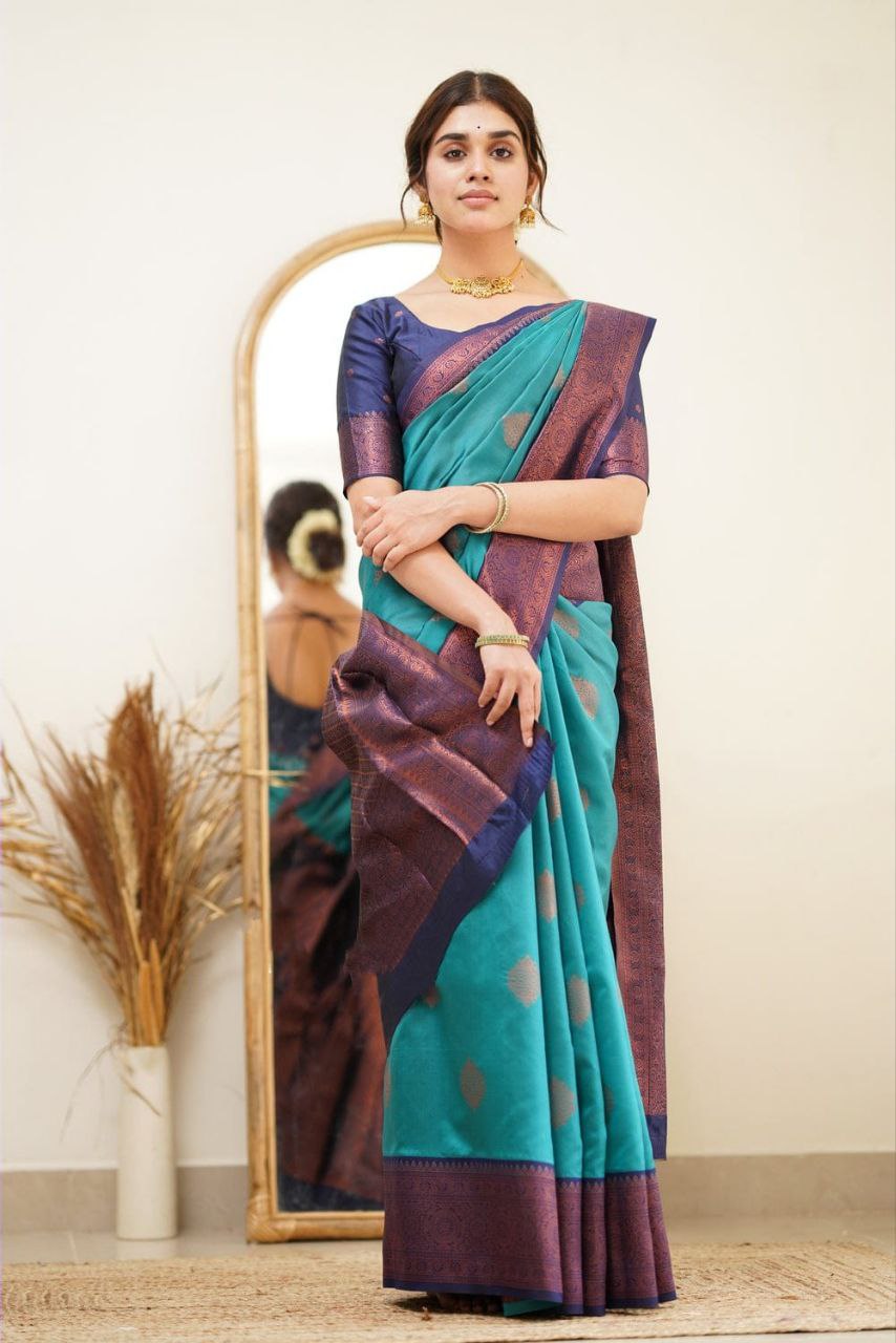Statuesque Firozi Soft Silk Saree With Dignified Blouse Piece